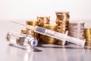 money and syringe | Image credit: gopixa - stock.adobe.com